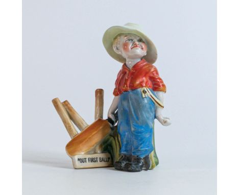 A rare Kinsella Ceramic figure of a Young Cricketer, titled "Out First Ball" c1910, Made in Germany, height 14cm, 