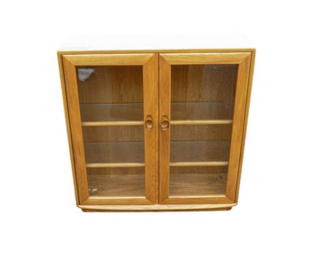 Late 20th century Light Ercol glazed display cabinet/bookcase, height 98cm, length 91cm &amp; depth 31cm 