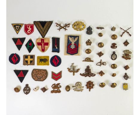 A collection of WWII &amp; later Military cap badges, button &amp; patches including South Wales Borders, ARP, The Buffs, Roy
