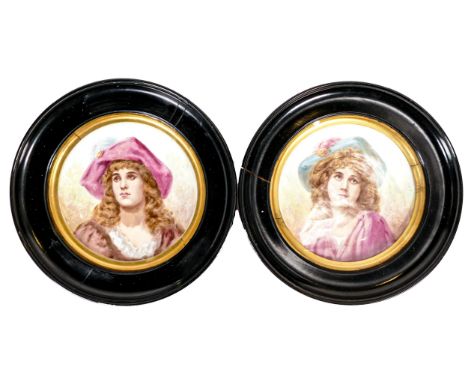 Two framed 19th century hand painted portrait plaques, diameter of frame 36cm (2) 
