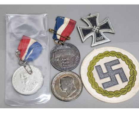 Bag containing Victoria jubilee medal, George VI medal, commemorative peace/war medal plus iron Nazi cross &amp; patch