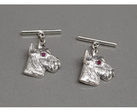 Pair of sterling silver dog cufflinks set with ruby eyes 4.10g gross