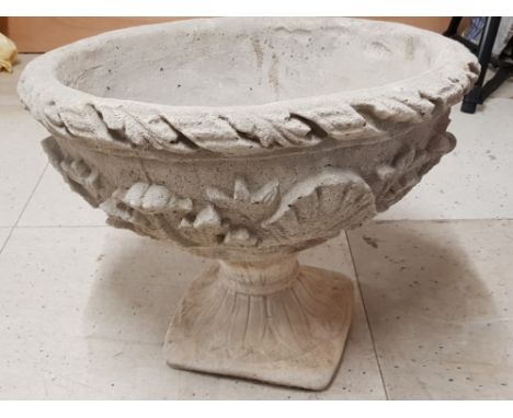 Large stone garden planter on pedestal base