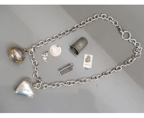 Box of silver chain with big heart &amp; globe pendant, early 19th century thimble plus 4 charms whic includes abacus