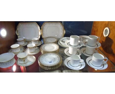 A Cauldon Part Coffee Service for Five, with swag decoration gilt Greek key banding on a white ground , comprising of 5 cups,