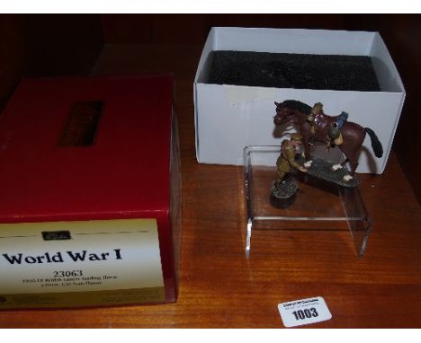 A W. Britain WWI (1916-18) British Lancer Feeding his Horse, 1/30 scale, complete with original box & packaging.