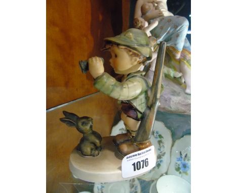 A Goebel Figure of a Boy Hunting.