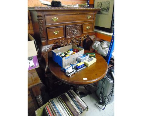 A Pair of Mahogany and Carved Bedside Tables, 20th Century, the rectangular tops with rope edge, drawers, carved apron and on