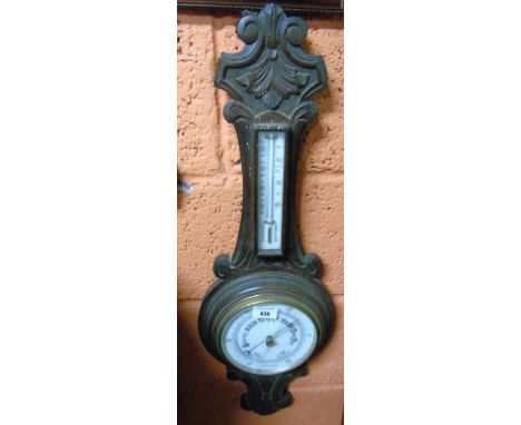 An Early 20th Century Oak Cased Barometer.
