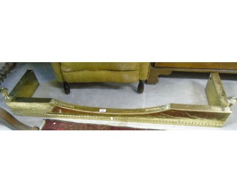 An Early 20th Century Brass Fender With Turned Finial Corners.