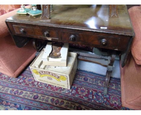 A Wonderful Regency Mahogany Sofa Table, with carved lyre ends, stretcher base and brass castors.