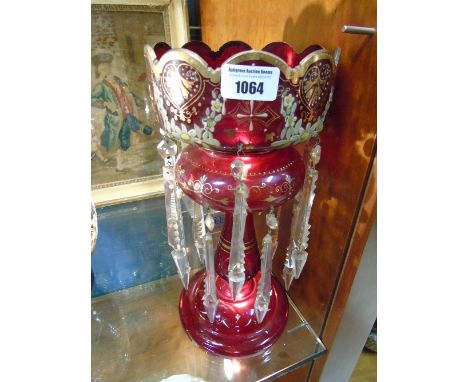 A Victorian Ruby Glass Lustre with drops.