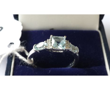 A 9ct Gold Aquamarine and Diamond Ring.