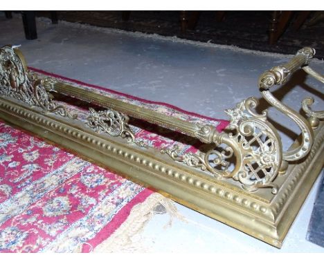 A Brass Fender with Foliate Decoration