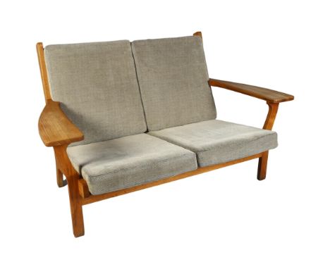 Hans Wegner, a mid-century Danish 2-seater sofa, model GE 330/2  by Getama, the oak frame with interior sprung cushions, widt