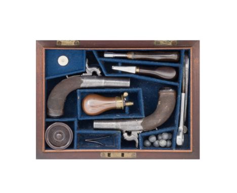 A Rare Cased Pair Of 60-Bore Percussion Box-Lock Pocket PistolsBy Purdey, London, Circa 1851With case-hardened turn-off barre