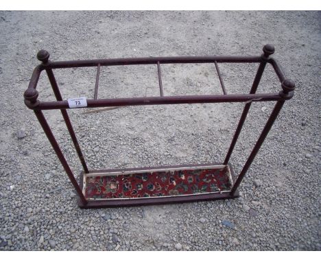 19th/20th C wrought metal four sectional stick stand (width 61cm) 