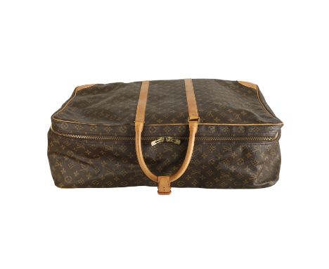 LOUIS VUITTON VINTAGE Reisekoffer "SIRIUS 65", Koll.: 1990, NP.: ca. 2.000,-€. Monogram Canvas Serie mit Rindsleder-Details, 