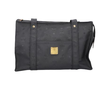 MCM VINTAGE Shopper. Beschichtetes Textil mit Logomuster in Schwarz. Hardware in Goldfarben. Front mit einem kleinen Außenfac
