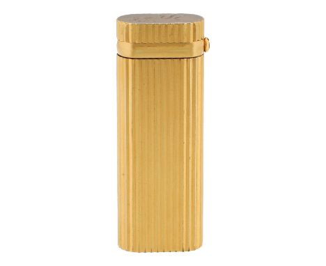 CARTIER VINTAGE Feuerzeug. Vergoldeter, strukturierter Korpus mit rubinrotem Steineinsatz und eingravierten Initialen. Etui a