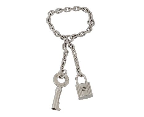 HERMÈS VINTAGE Tuchring "CADENA". Silberfarbene Gliederkette mit Schloss und Schlüssel. Box und Staubbeutel anbei. Schöner Er