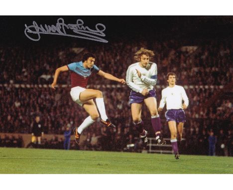 Autographed TREVOR BROOKING 12 x 8 photo : Col, depicting a wonderful image showing West Ham United's TREVOR BROOKING in mid-