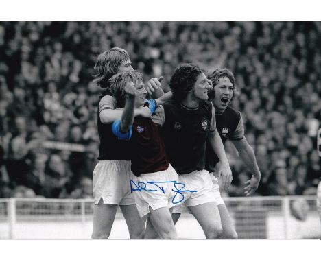 Autographed ALAN TAYLOR 12 x 8 photo : Colorized, depicting West Ham United's ALAN TAYLOR being congratulated by team mates K