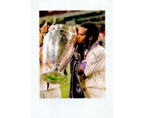 CHRISTIAN KAREMBEU signed 8x12 Real Madrid 1998 European Cup Photo . Good condition. All autographs come with a Certificate o