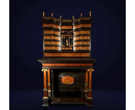 Solid ebony and tortoiseshell placage with grotesque characters decors in gilded brass finely inlaid with mother-of-pearl and
