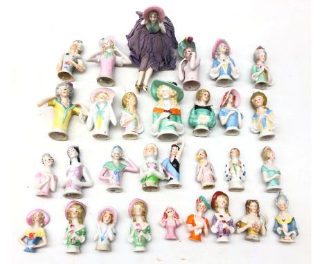 Collection thirty of ceramic pin cushion/ half dolls of varying sizes, including one with pin cushion base & legs, H10cm max 