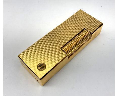 Dunhill gold-plated lighter no. 14618, unboxed Condition Report Click here for further images, condition, auction times & del
