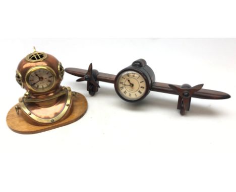 Copper and brass divers helmet clock on oblong oak plinth H20cm and another in the form of an Aeroplane (2) Condition Report 