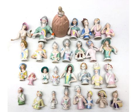 Collection thirty of ceramic pin cushion/ half dolls of varying sizes, including one with pin cushion base, H11cm max  Condit