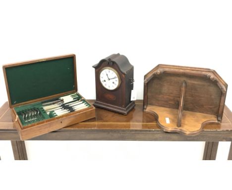 Oak canteen of EPNS cutlery, an oak wall bracket and an Edwardian inlaid mahogany mantel clock (3) Condition Report Click her