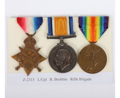 A Great War 1914-15 star medal trio to a recipient in the Rifle Brigade who was discharged due to wounds in August 1916. 1914