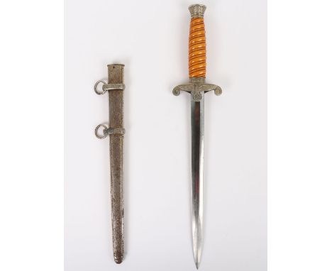 WW2 German Army Officers Dagger: Orange celluloid grip dagger , top pommel with oakleaves and cross guard in the form of army