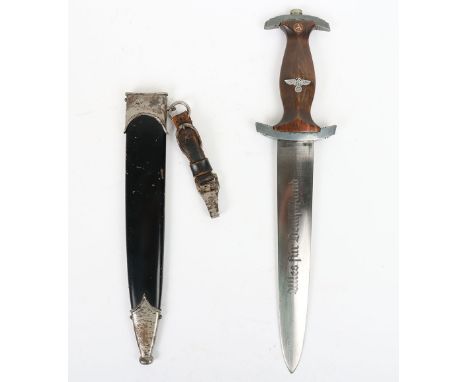 Third Reich NSKK Mans Dagger: Enlisted mans NSKK dress dagger with wooden handle having eagle and enamel SA devices. Housed i