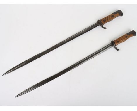 Imperial German Model 1898 Bayonets: Both  with two piece wooden grips, steel pommel , cross guard and pipe back blades with 