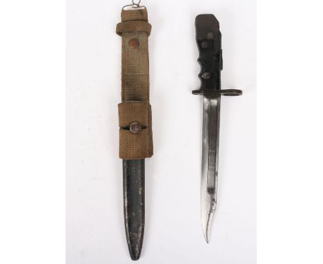 British No7 MK 1/L Bayonet: Bakelite grip in working action with blade stamped NO7 MK1/L and armour stamps, complete with sca