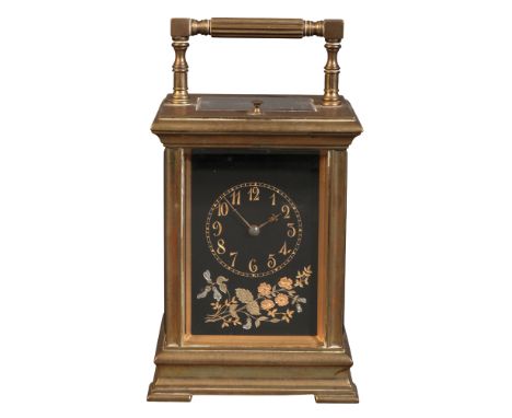 A FRENCH BRASS CARRIAGE CLOCK early 20th century, the black painted dial with engraved gilded Arabic numerals and decorated w