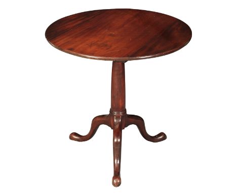 A GEORGE II MAHOGANY TRIPOD TABLEthe circular tilt top with a birdcage movement, on a turned columnar stem to cabriole legs a