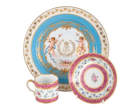 A SÈVRES PORCELAIN COFFEE CAN AND SAUCER 18th century, enamelled with floral sprays within mottled puce and gilded borders, d