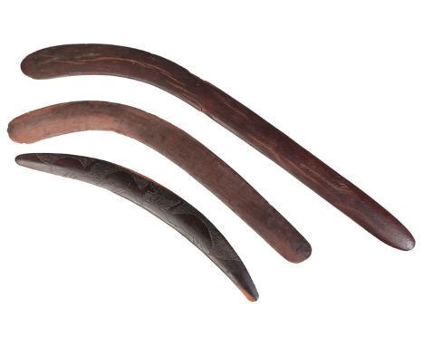 AN ABORIGINAL MULGA WOOD BOOMERANG Australia, early 20th century, 71.5cm long; together with another similar, mid 20th centur