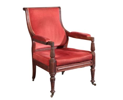 A WILLIAM IV MAHOGANY LIBRARY ARMCHAIR with red velvet covers, the shaped square back over cushioned arms and a square seat, 