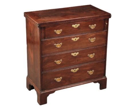 A GEORGE II MAHOGANY BACHELOR'S CHEST circa 1740, the folding rectangular top opening on two lopers, over four graduated draw