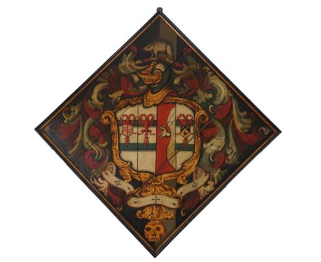 A late 18th / early 19th century oil on wooden panel hatchment with coat of arms with wild boar crest and skull finial, 130 x