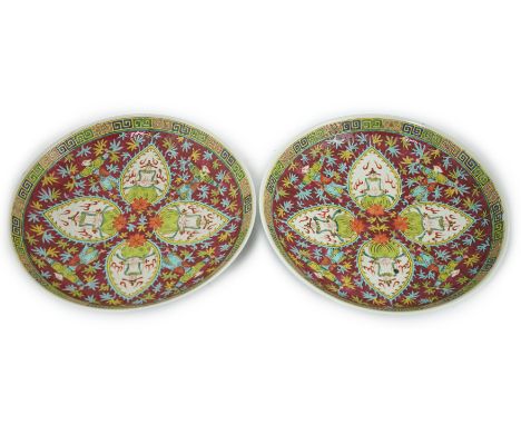 A pair of Chinese Bencharong enamelled porcelain dishes, Republic period, made for the Thai market, each painted with Buddhis