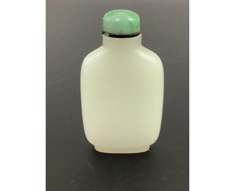 A Chinese white jade snuff bottle, 19th century, of flattened high shouldered form, the stone of excellent even tone, 6.2cm h