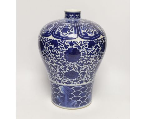 A Chinese blue and white meiping, Qianlong mark, early 20th century, painted with the eight Buddhist emblems to the shoulder,