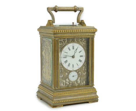 An early 20th century French silvered brass grand sonnerie alarum carriage clock with fretwork panels to the face and sides, 